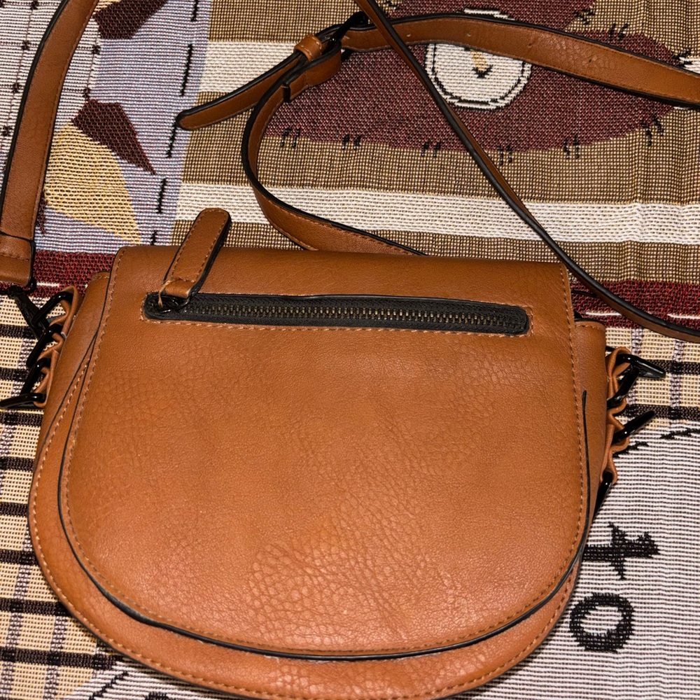 Yoki Tan Pebbled Crossbody Saddle Bag with Black Trim